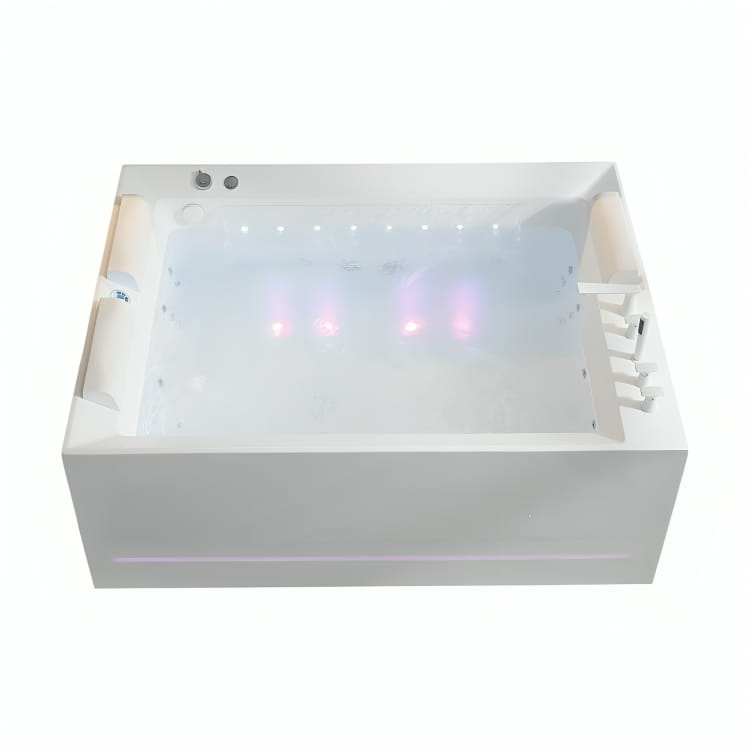 Tina de hidromasaje Mikonos vista frontal con cromoterapia encendida y sistema de hidromasaje en funcionamiento